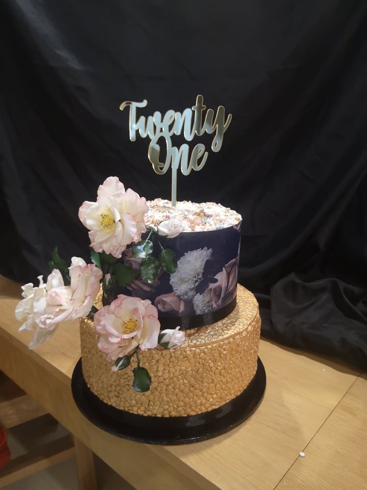 Twenty first birthday cake with two tiers and hand made sugar paste English roses looking realistic