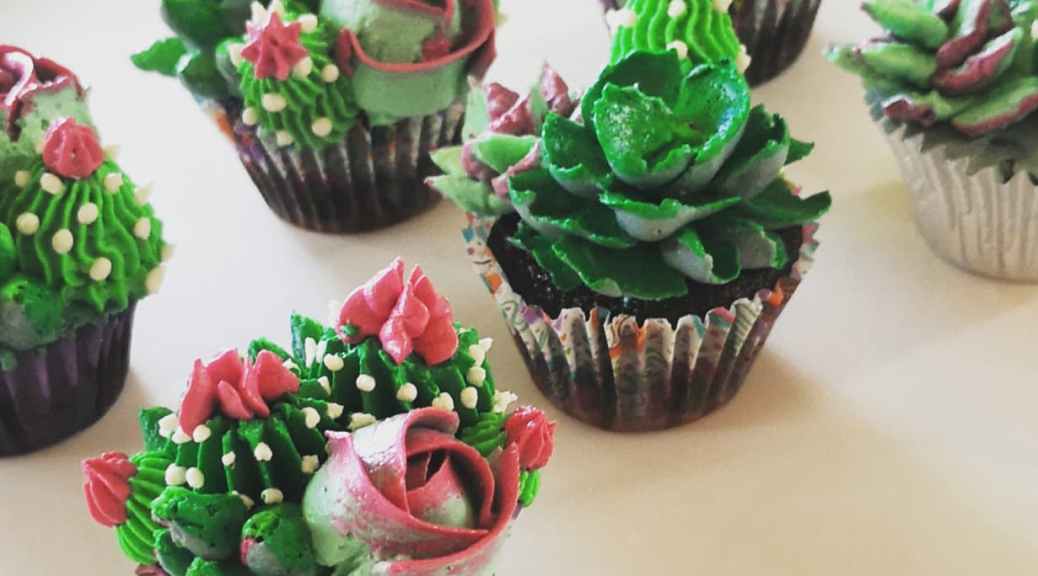 Floral cupcakes with succulents in shades of green and pink