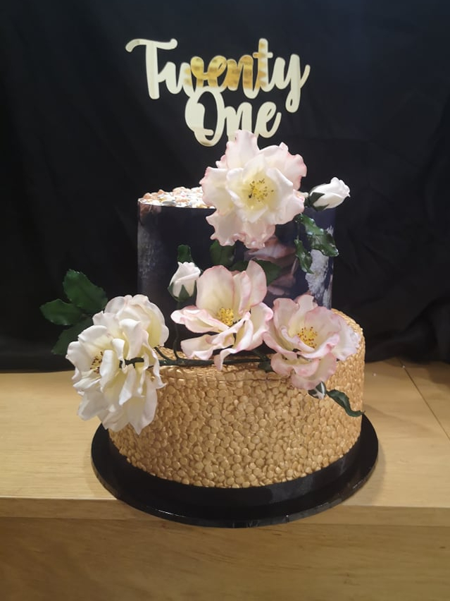 Twenty first birthday cake with two tiers and hand made sugar paste English roses looking realistic