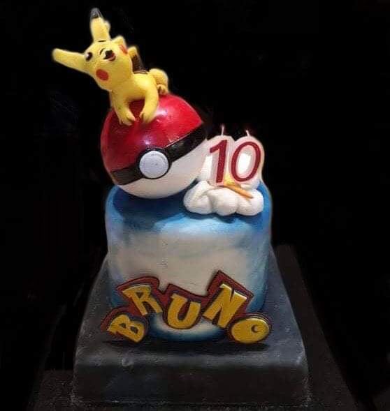 10th birthday cake with Pikachu and red ball personalised name