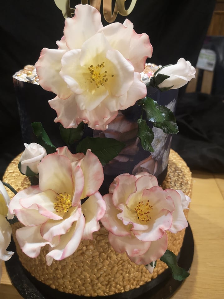 Twenty first birthday cake with two tiers and hand made sugar paste English roses looking realistic