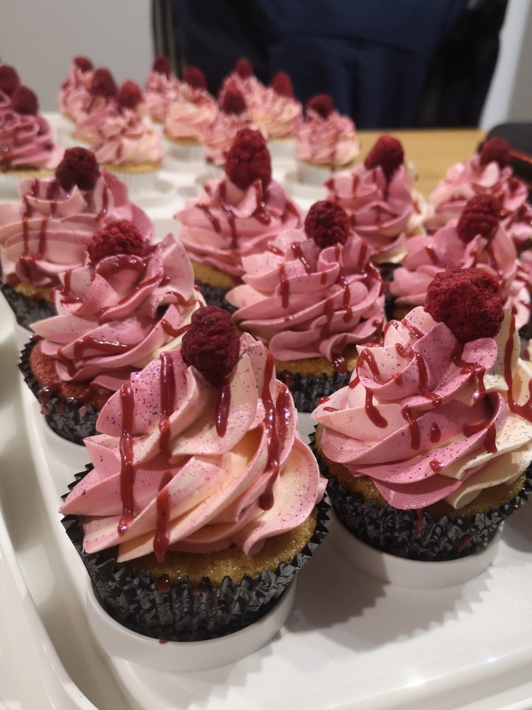 Delicious raspberry Cupcakes with pink buttercream, raspberry coulis and freeze dried raspberry - by Embellished Food Art, Lower Hutt, Wellington cake decorator