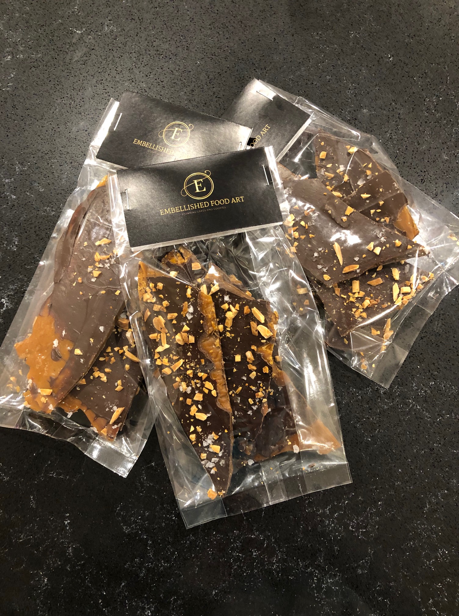 The yummiest toffee bark coated in dark chocolate with almonds and salt crystals