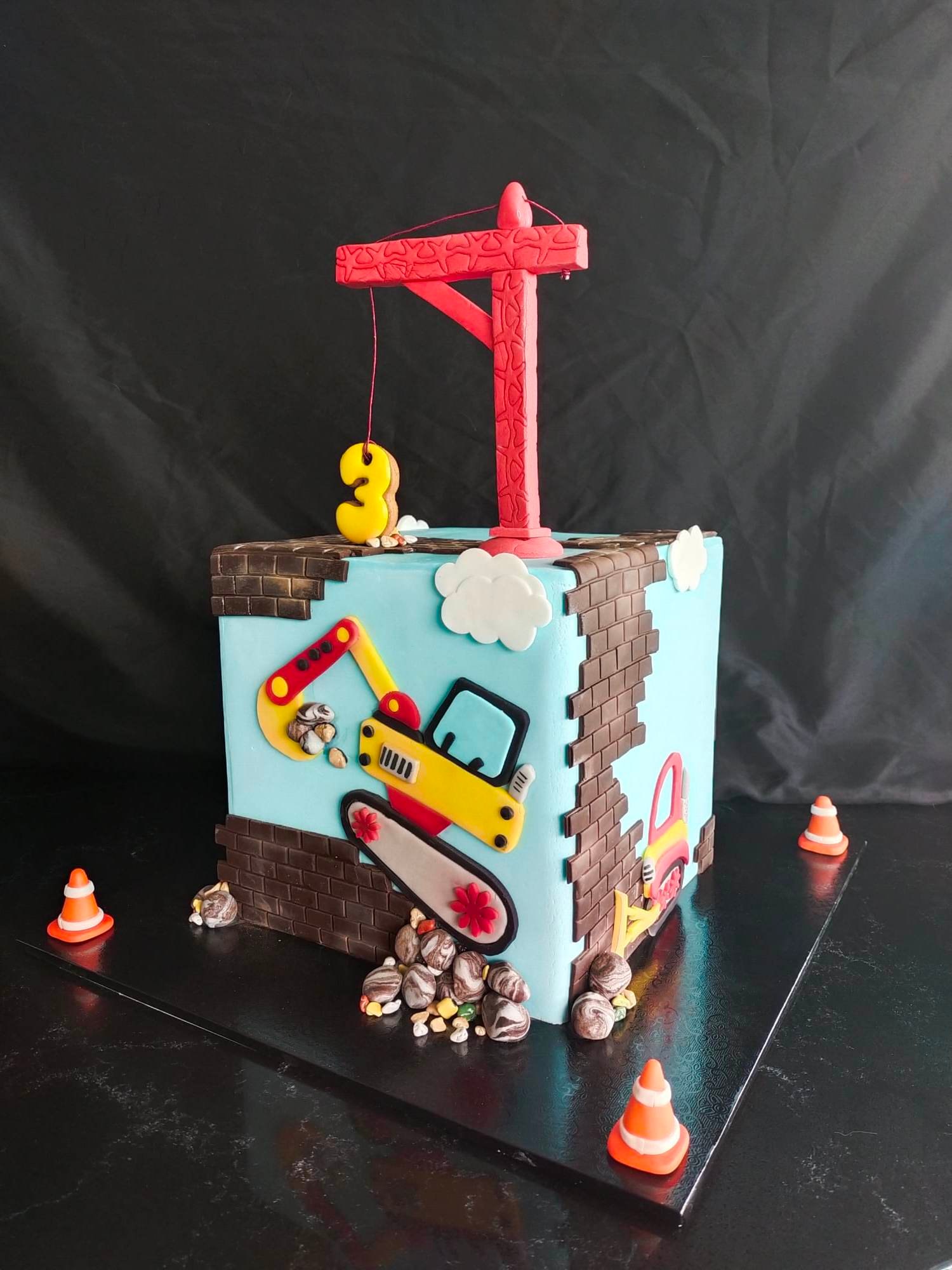 Construction themed 3rd birthday cake with 3D crane and fondant cutouts