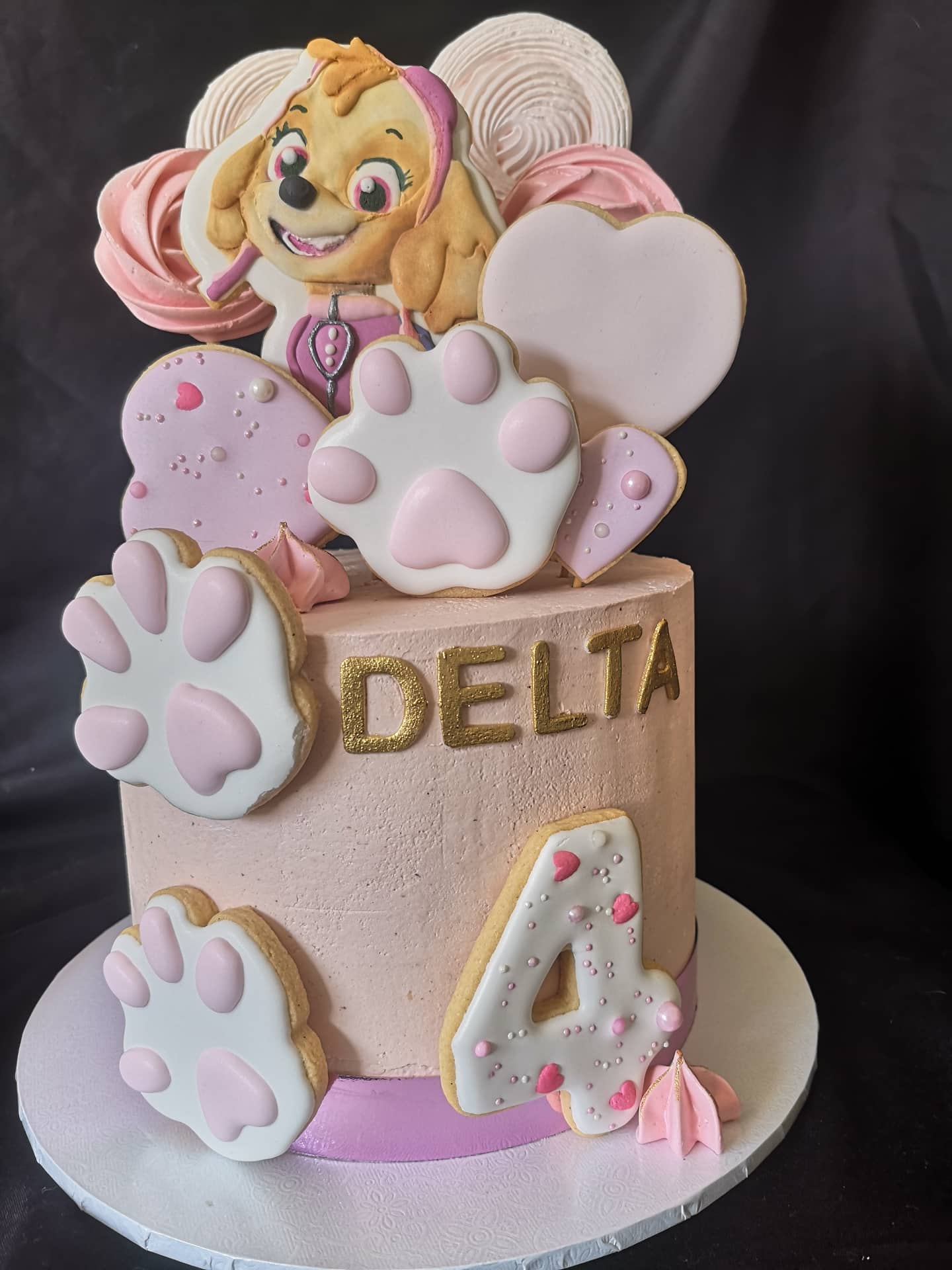 Paw Patrol pink 4th birthday cake with cookies and meringues